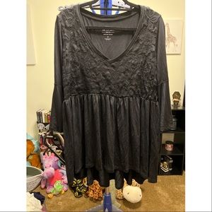 Torrid size 1 babydoll with lace design on top. Roomy & stretchy. Bell sleeves